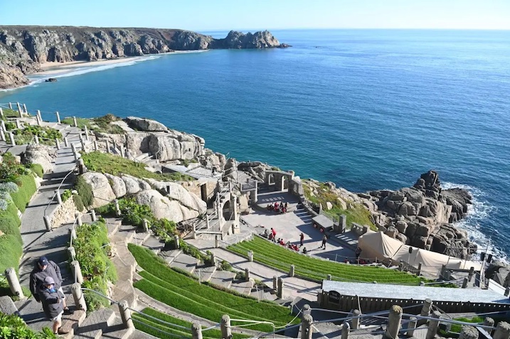 Minack theatre looking down at Porthcurno beach white sand beautiful beach low tide steep steps down