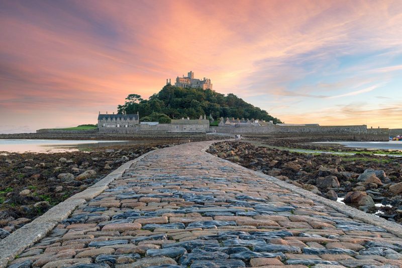 sunset at st michaels mount cornwall rock pools sandy beach golden sand